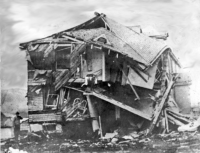 1942: Dutch Harbor, AK, 3 June 1942. Japanese Attack...building damage.  [Sam Shout]